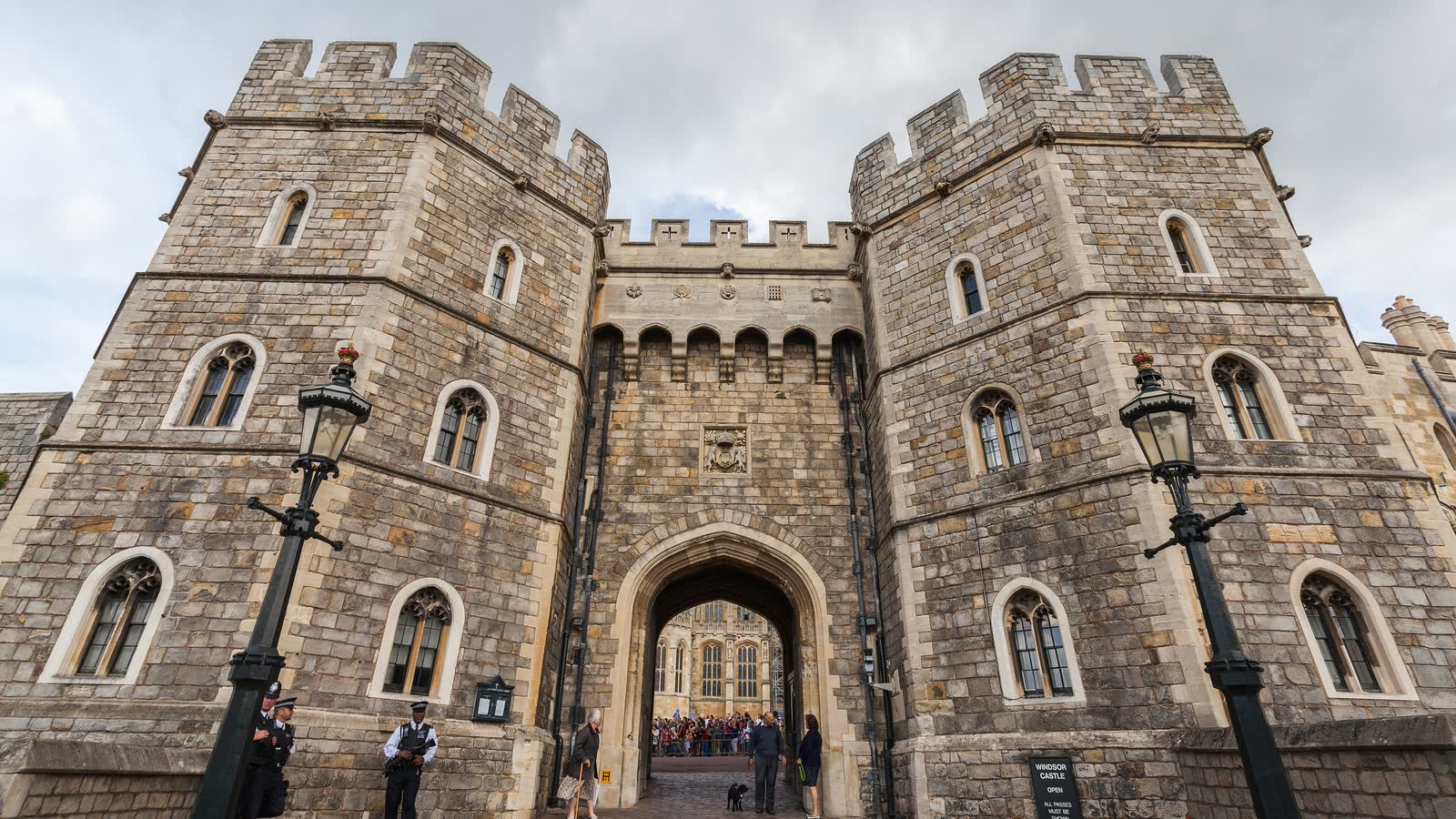 The stone towers and arched gateway of the King Henry VIII Gate at Windsor Castle